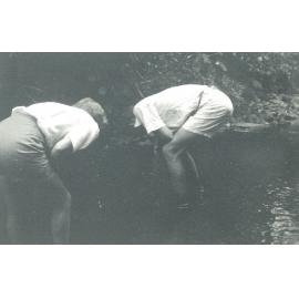 Students looking in a stream, 1947