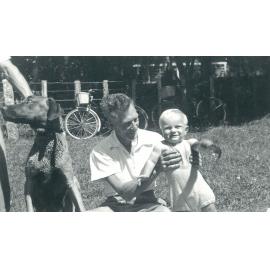 William Albert Jacques with baby, 11 December 1949
