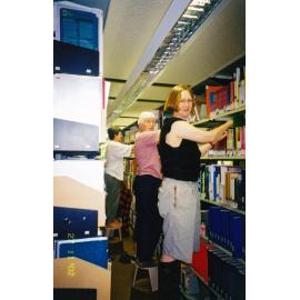 Turitea Library, shelf-tidying,  2002