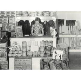 Tamaki-Kiritaki Co-operative Dairy Company Limited. Store interior showing Miss Nancy Sturrock behind the counter, 1959